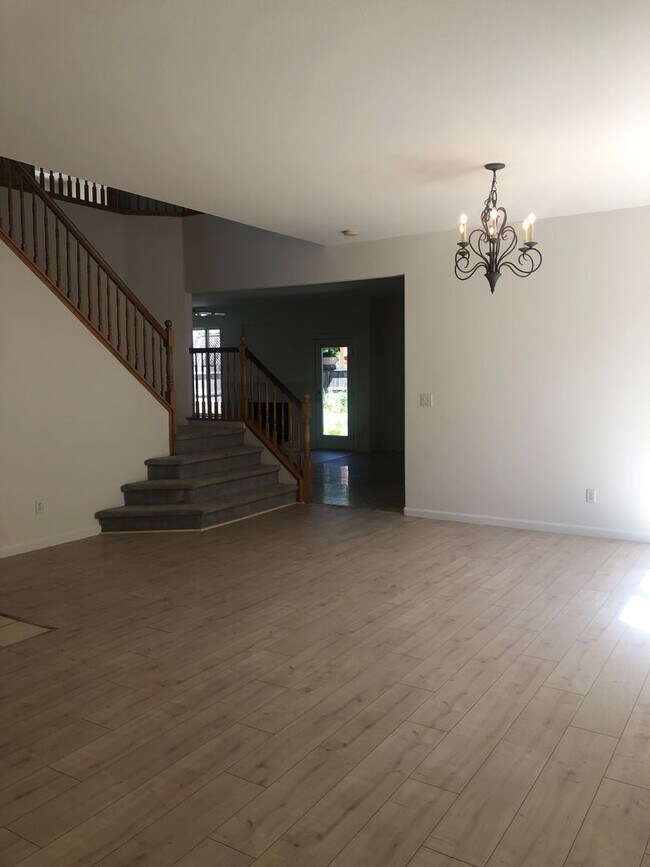 Building Photo - Three Bedroom and Three bathroom home and ...