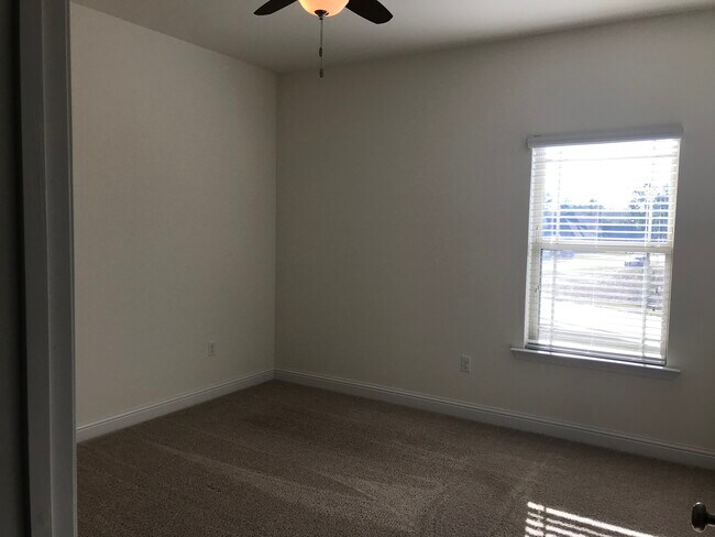 Back side bedroom upstairs with walk in closet - 3776 River Trace Dr