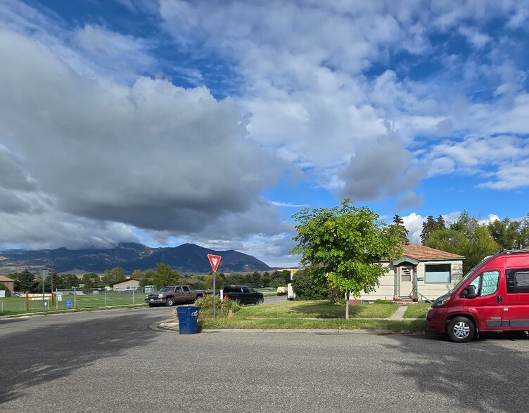 Front of home with view of park and Bridger Mountains - 624 N Grand Ave