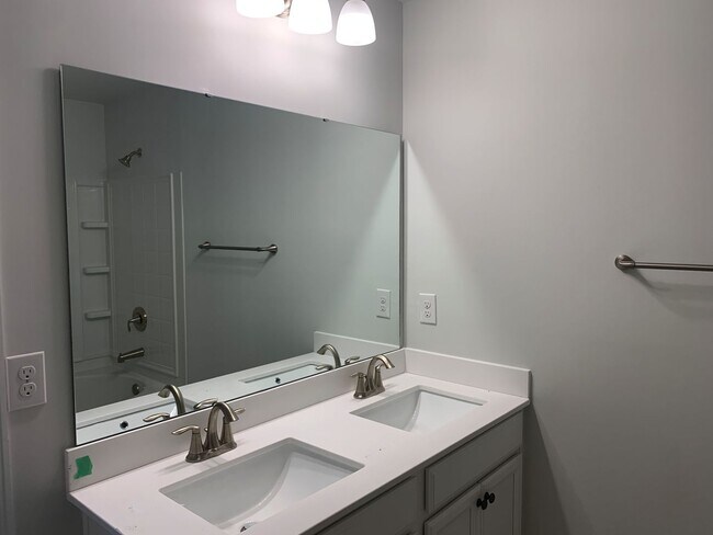 Building Photo - 4 Bedroom, 2.5 Bath, Pet Friendly Town Home with Garage Within Barefoot Resort and Golf! Availabl...