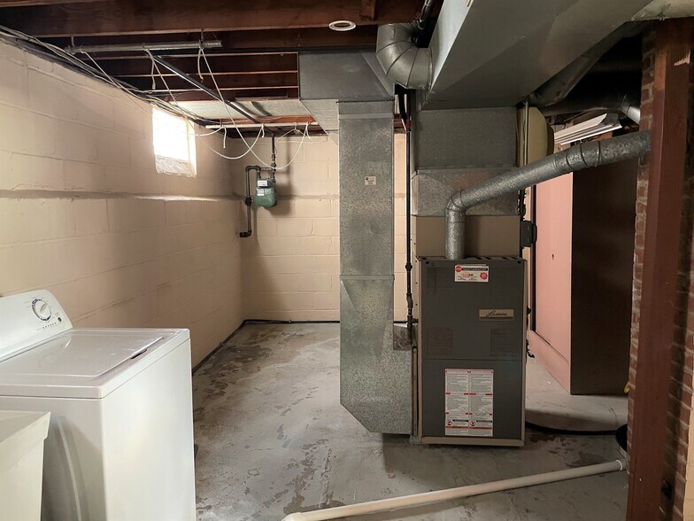 Basement - utility area with storage - 1204 Irene Rd