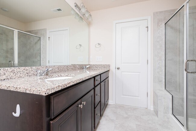 Building Photo - End unit townhome loaded with upgrades close to RTP! Available: Now