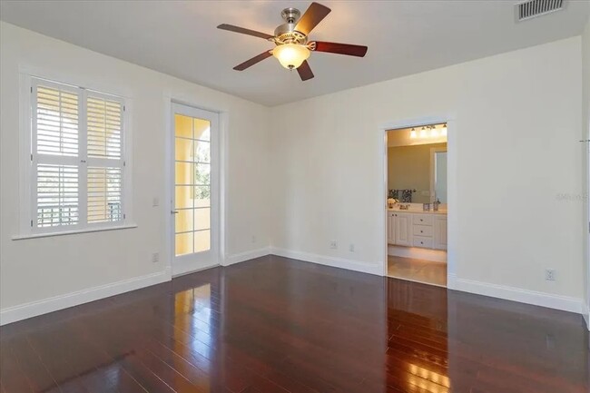 Master bedroom with balcony - 8438 Gilford Ln