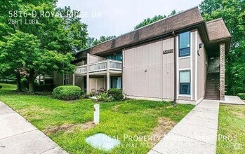 Building Photo - Freshly painted and updated walk out condo...