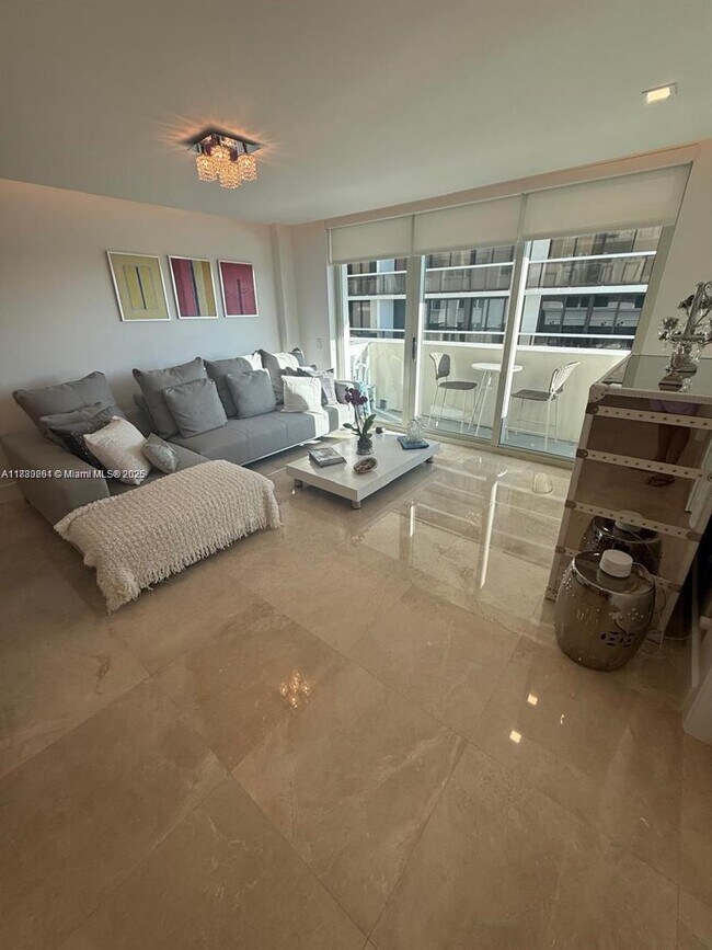 Building Photo - 9499 Collins Ave