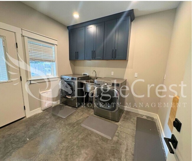 Building Photo - Contemporary Home With A Covered Patio & Quartz Countertops
