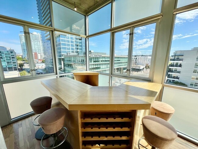 Building Photo - Stunning Corner Loft in East Village with Floor-to-Ceiling Windows & City Views!