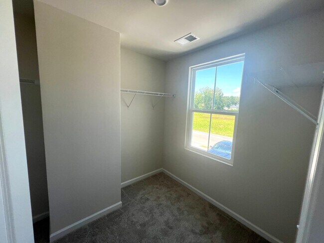 Building Photo - New Three-Bedroom, Two and one-half Bath T...