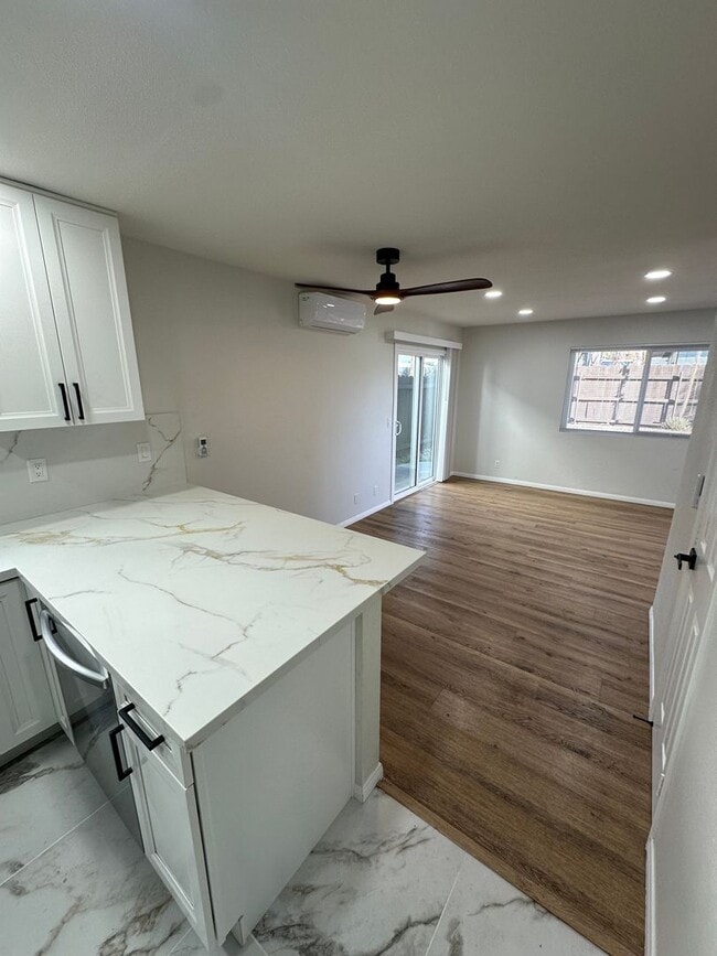 Building Photo - Remodeled 2 Story 3BR/2BA House with Vinyl plank flooring, Fenced backyard & 2 Car garage and more!