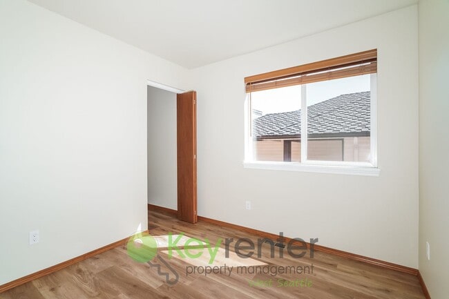 Building Photo - Bright 2-Bedroom with Garage, Storage, and...