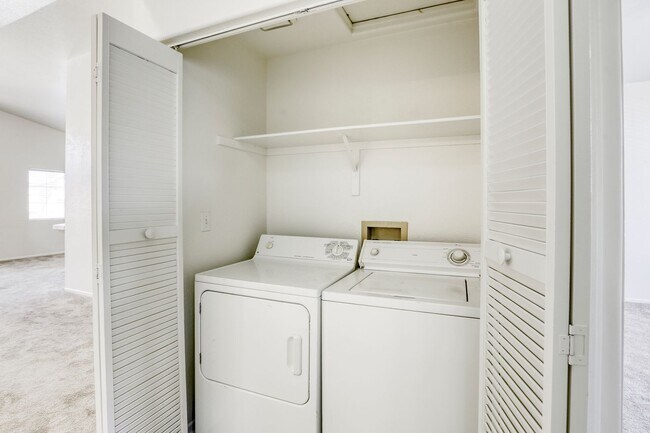 Building Photo - 2 bedroom condo with RARE attached 2 car g...