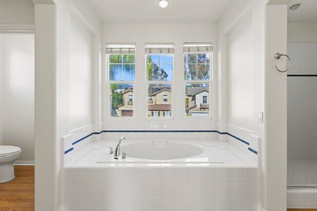 Building Photo - Remodeled 5 Bedroom Home in HOA