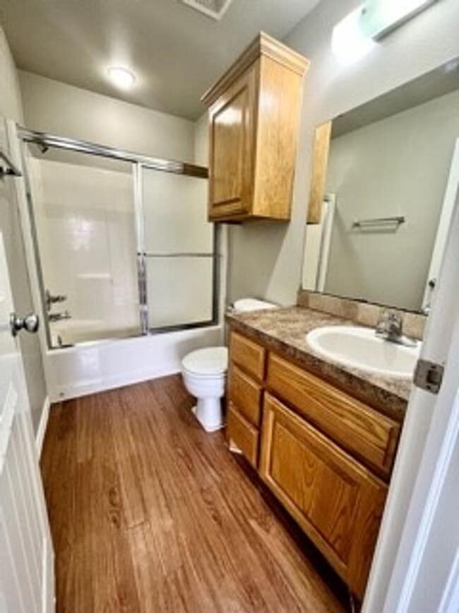 Building Photo - Spacious 3-Bed, 2.5-Bath Fourplex with Gar...
