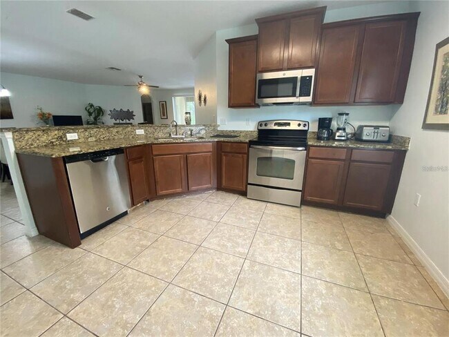 Building Photo - 9027 Paolos Pl