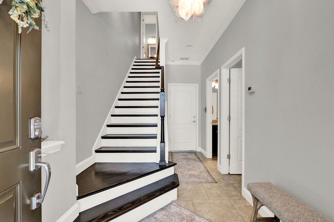 Building Photo - Stunning 3/3.5 Baldwin Park Townhome with 2-Car Garage & Upgrades Galore!
