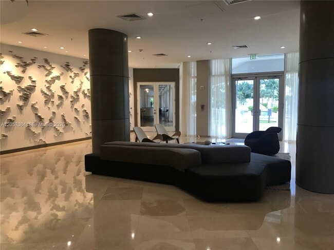 Building Photo - 10275 Collins Ave