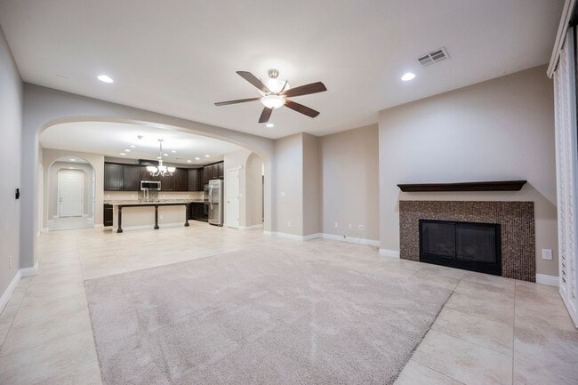Building Photo - Single Story w/ duel primary suites gated ...