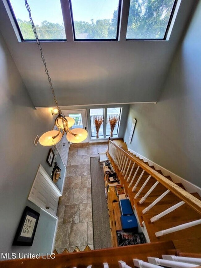 Building Photo - Riverfront Living with Private Boat Launch