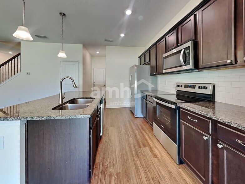 Building Photo - 6605 Hidden Rose Pl