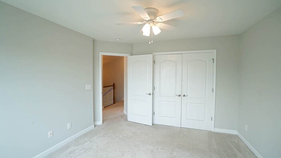 Bedroom #2 - closet and door - 1207 Heritage Links Dr