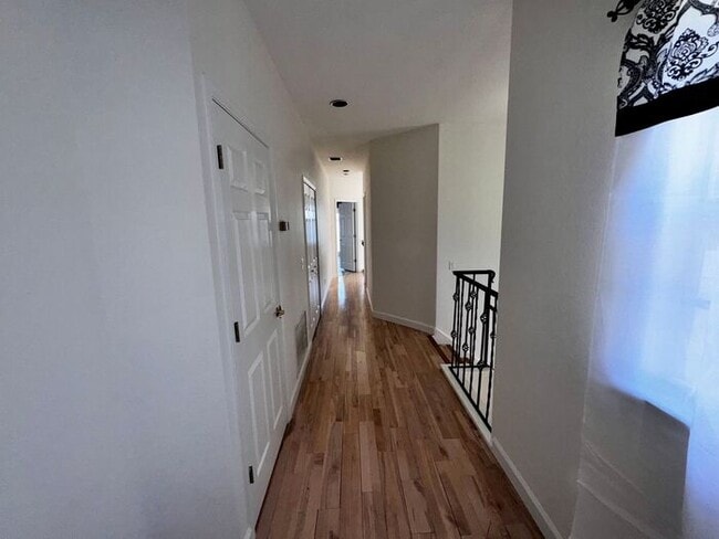 Building Photo - 3 Bedroom 2.5 Bath Cinnamon Bay Home with Stunning view, and Hardwood Flooring!