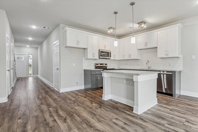 Building Photo - Be the first to live in this beautifully crafted 3-bedroom, 2.5-bath duplex—newly built and never...