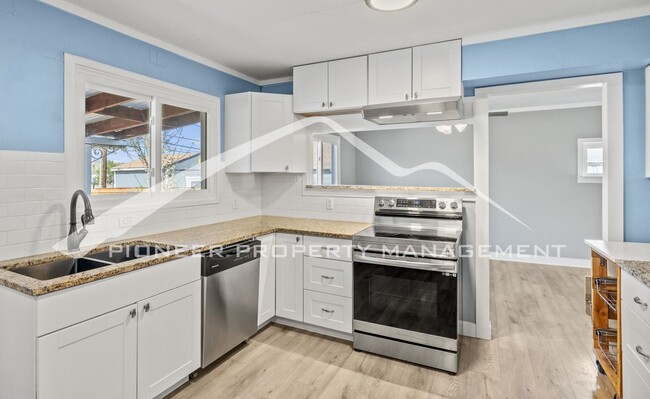 Building Photo - Updated 3-Bedroom Home with Solar, Worksho...