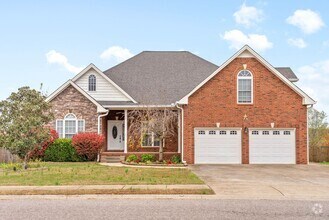 Building Photo - Spacious 4-Bedroom Gem with Open Floorplan!