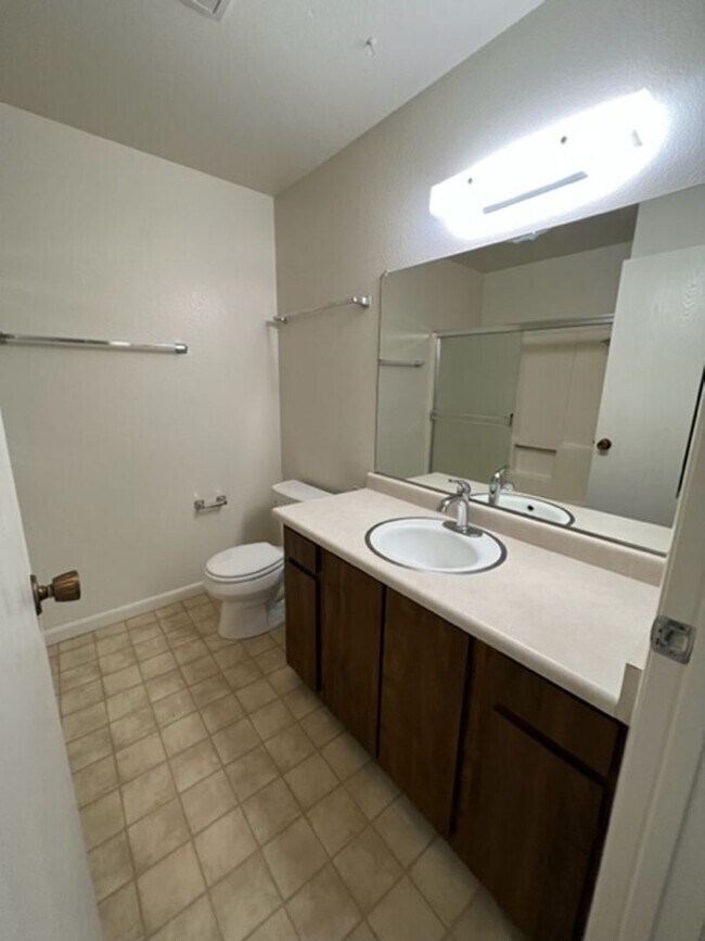 Building Photo - Spacious Condo with Private Patio