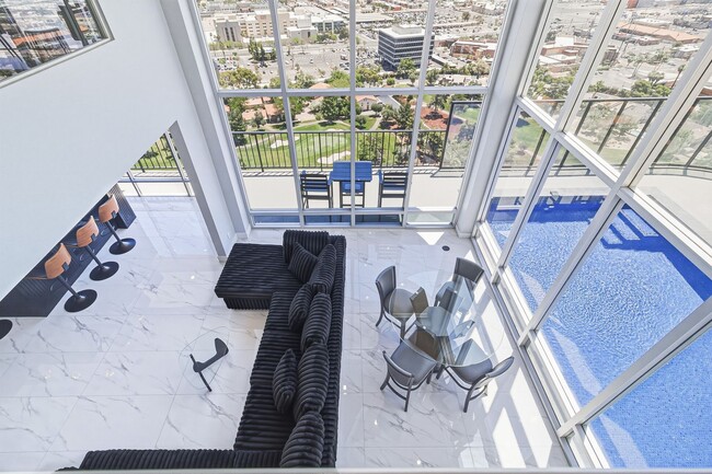 Building Photo - Luxury Penthouse Retreat with Private Pool, Sauna & Strip Views