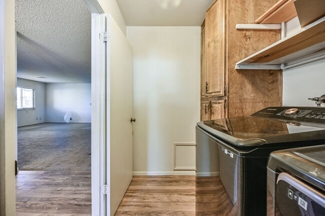 Building Photo - 3 bedroom, 2 bath with large living room and brick fireplace.  Good size kitchen with tons of cab...