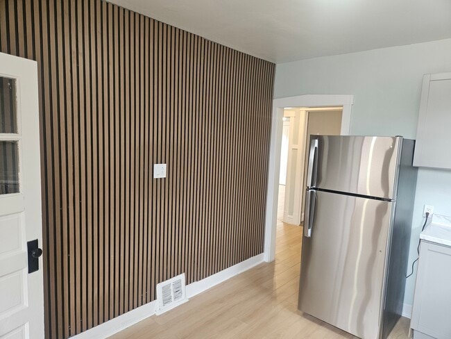 Building Photo - 6125 W Newport Ave