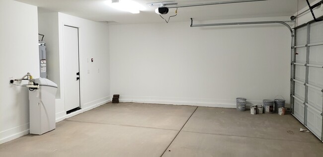Building Photo - The 2 YEARS NEW 4 bedroom + 3 car garage r...