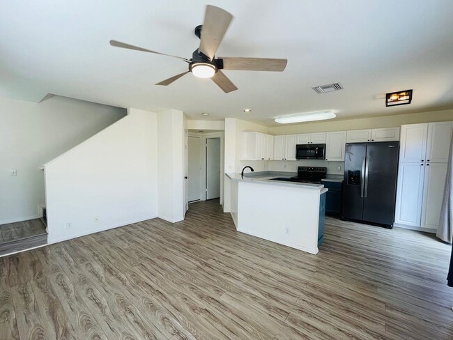 Building Photo - Partly Furnished 3-bedroom, 2.5-bath home,...