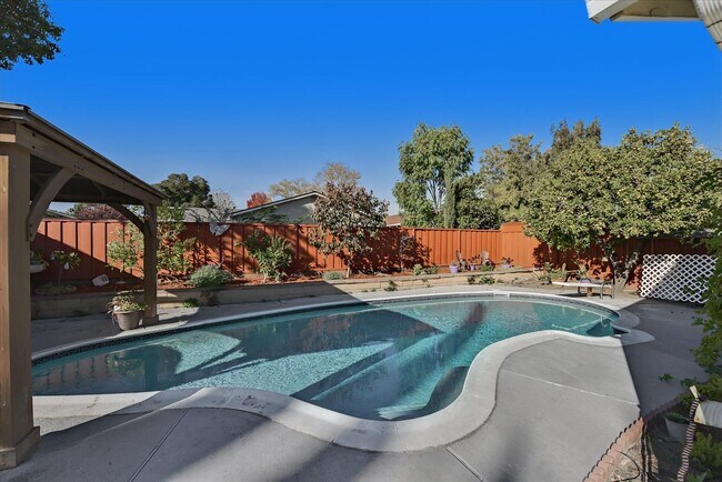 Building Photo - Beautifully Updated Single Family Home with Sparkling Pool
