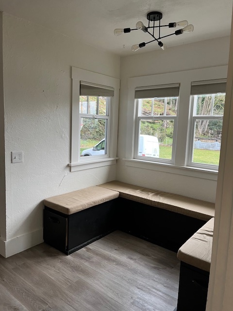 wrap around bench seat with storage in kitchen nook - 810 E Magnolia Ave