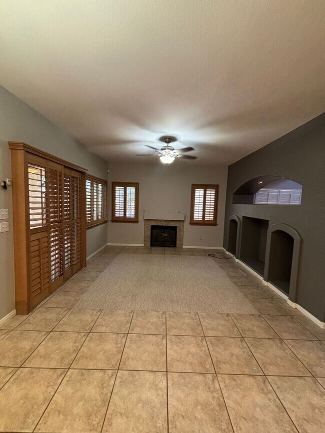 Building Photo - Gated Green Valley Ranch Townhome | 2 Bed | 2.5 Bath | 2-Car Garage