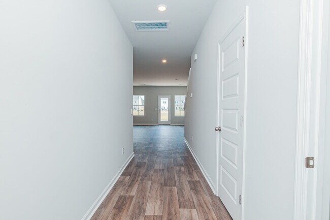 Building Photo - Brand-new 3 bedroom, 2.5 Bath Townhome with pond view