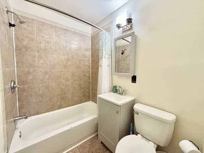 Building Photo - Cozy Home with Private Backyard & Detached...