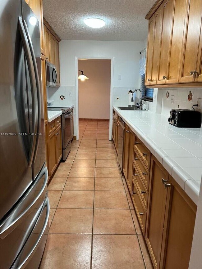 Building Photo - 5780 SW 59th Pl