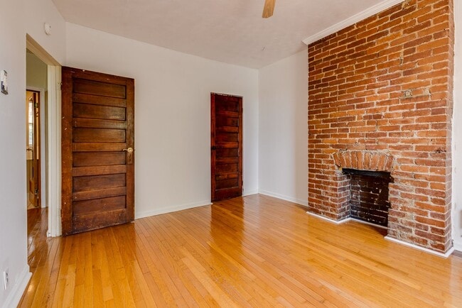 Building Photo - AVAILABLE June 2026 - Beautiful 4 Bedroom, 2 Bath Home w/ Front Porch Swing!