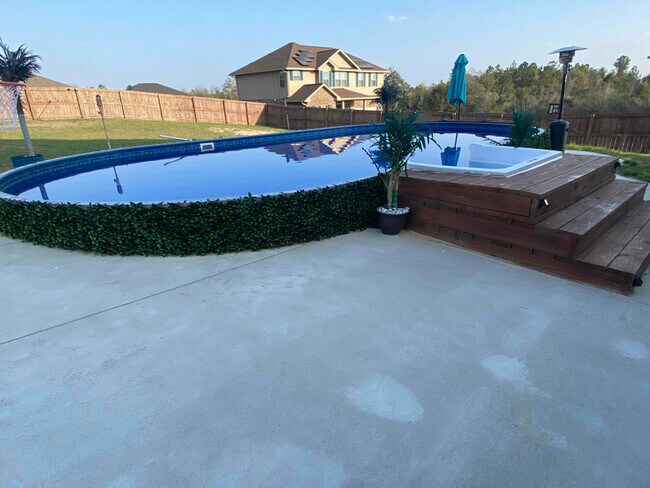 Building Photo - 5747 Periwinkle Ln