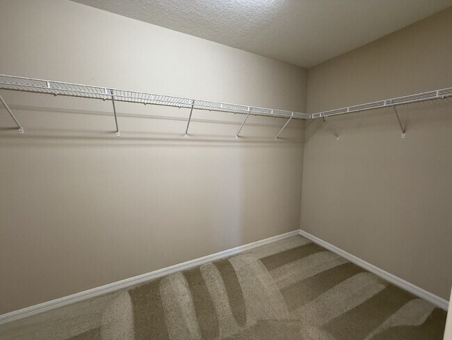 Building Photo - Spacious 4-Bedroom Retreat with additional office/den in the Heart of Trinity!