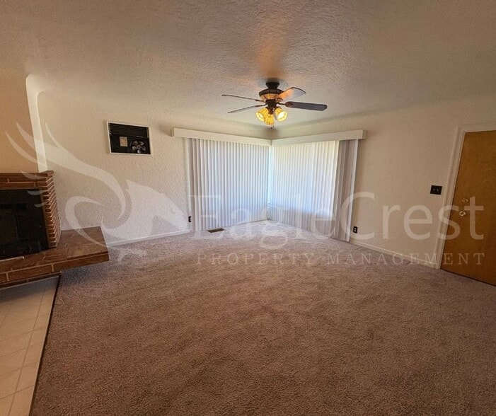 Building Photo - Three Bedroom, Two Bathroom House with Fenced Yard and Outdoor Fireplace