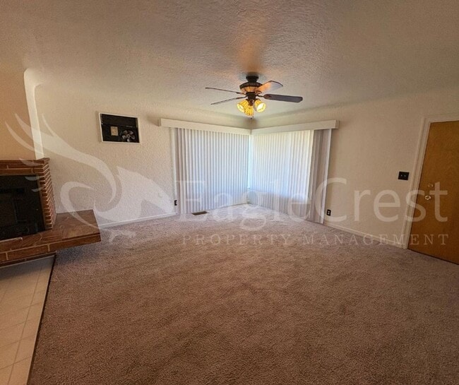 Building Photo - Three Bedroom, Two Bathroom House with Fenced Yard and Outdoor Fireplace