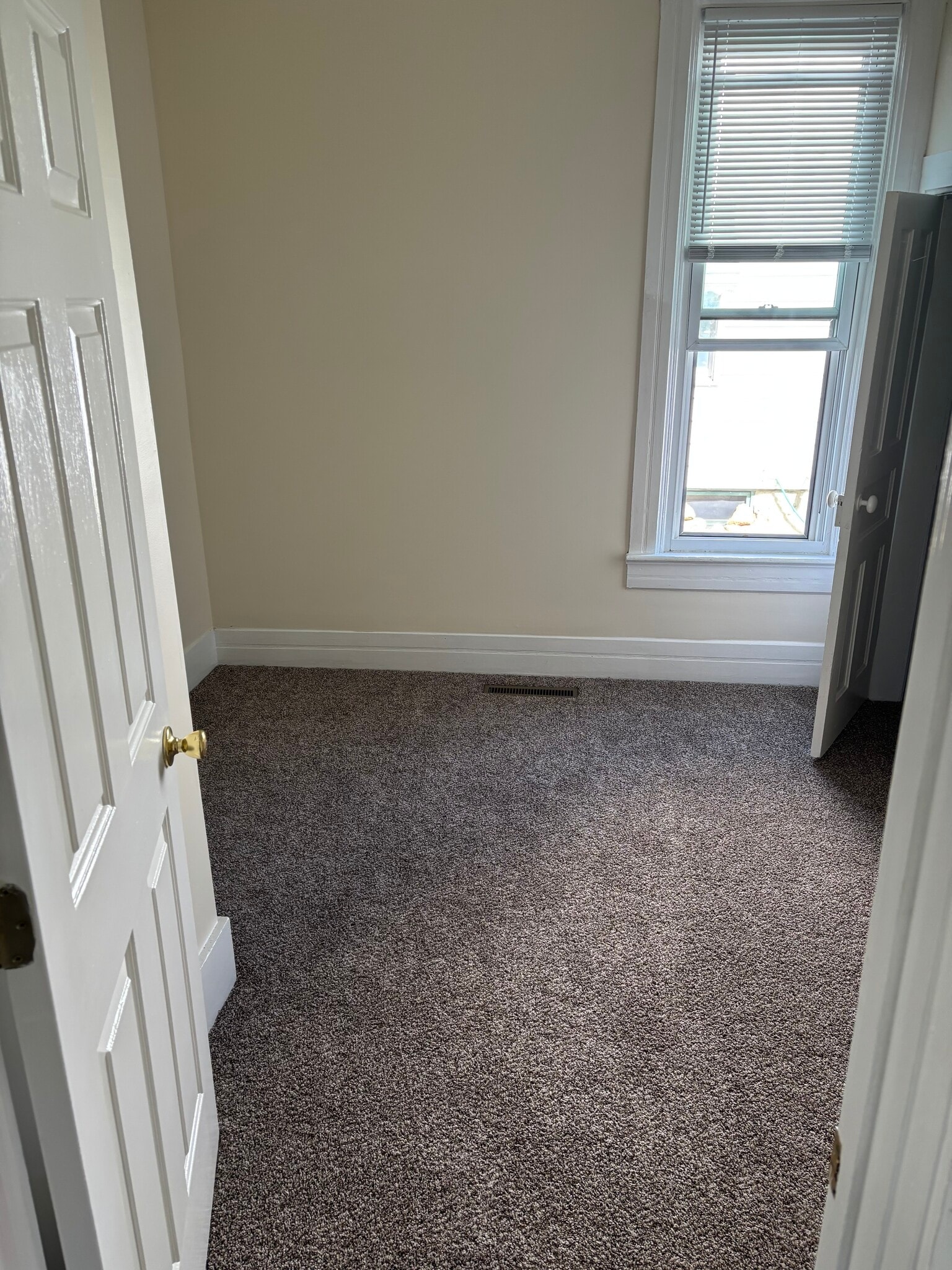 Small bedroom downstairs. - 319 Garfield Ave