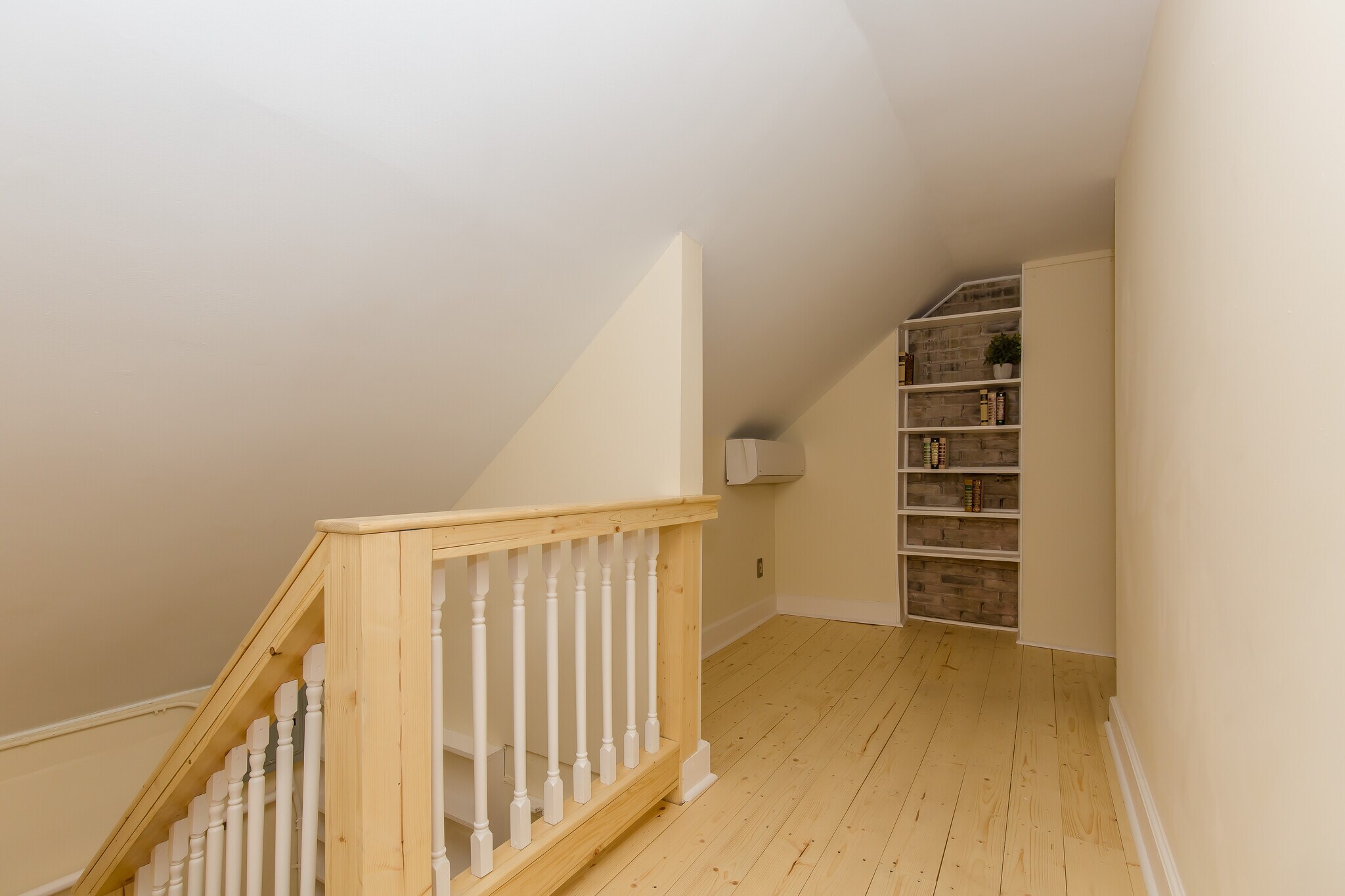 Upper floor of apartment with built in book shelf - 715 5th St SE
