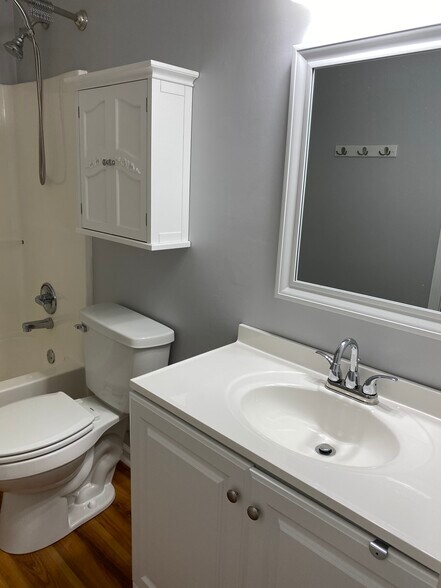Full bath has marble sinks and plenty of storage - 1305 Cedar Shoals Drive #500