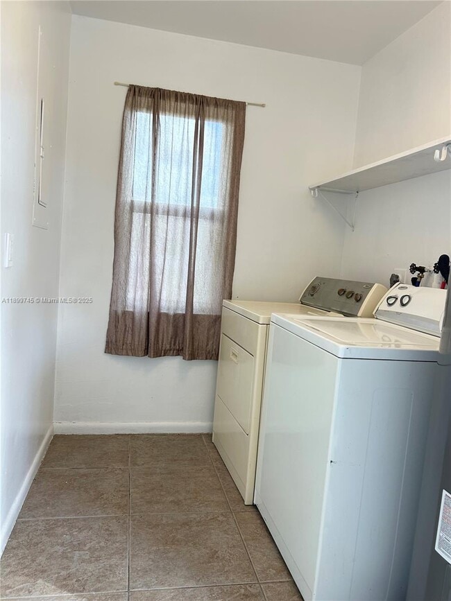 Building Photo - 6452 Royal Palm Beach Blvd