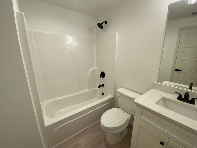 Building Photo - NEW CONSTRUCTION 5 BEDROOM PRE-LEASING FOR...
